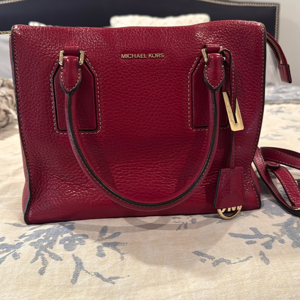 Michael Kors leather purse with detachable strap.